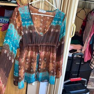 Very lightly top sheer fabric y beautiful design and colors
